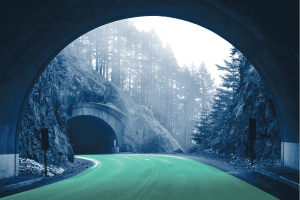 View of the road coming out of a tunnel.